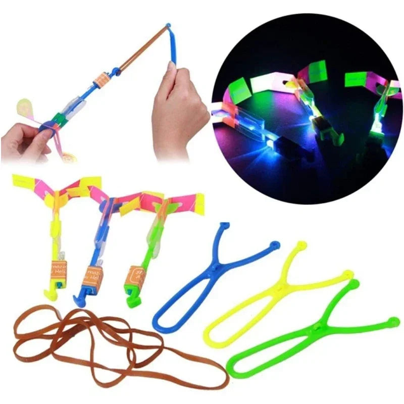 LED Arrow Rocket Helicopter Flying Toy — Rubber Band Launcher (1–50 Pack)