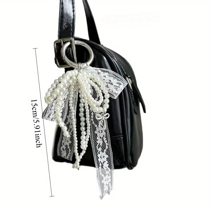 Colgante de lazo de encaje de perlas — Charm de moda para bolso y accesorio para llavero de coche