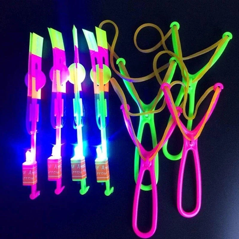 LED Arrow Rocket Helicopter Flying Toy — Rubber Band Launcher (1–50 Pack)