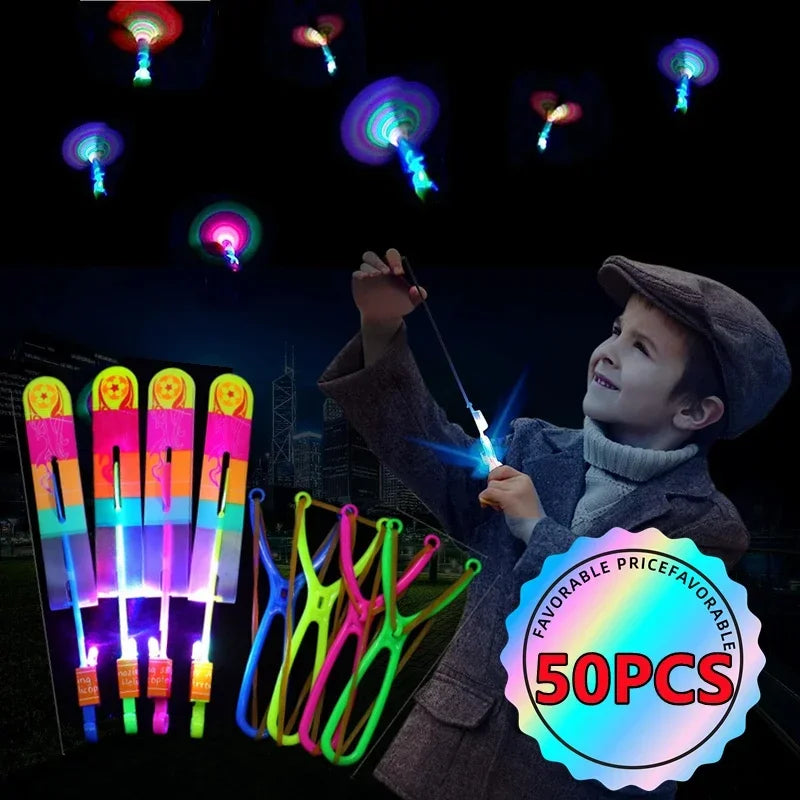 Juguete volador LED Flecha Helicóptero Cohete — Lanzador de goma (Paquete de 1 a 50)